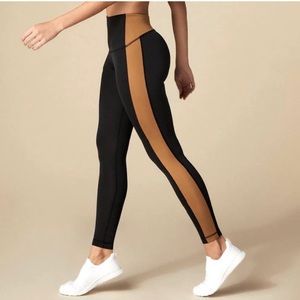 Shop Tan Lines • XS Color block leggings worn once